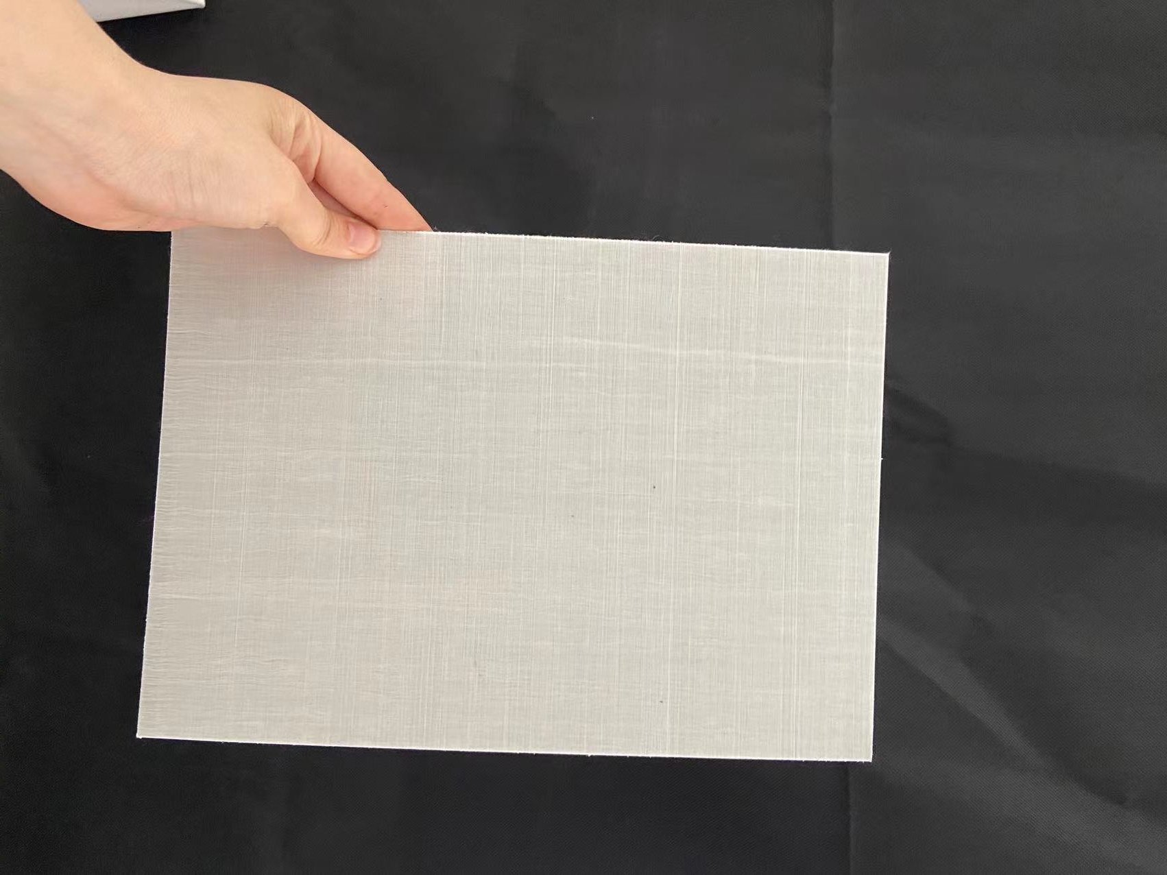 CFRT合片實(shí)心闆—可做汽(qi)車輕量化熱(re)塑性複合材(cai)料